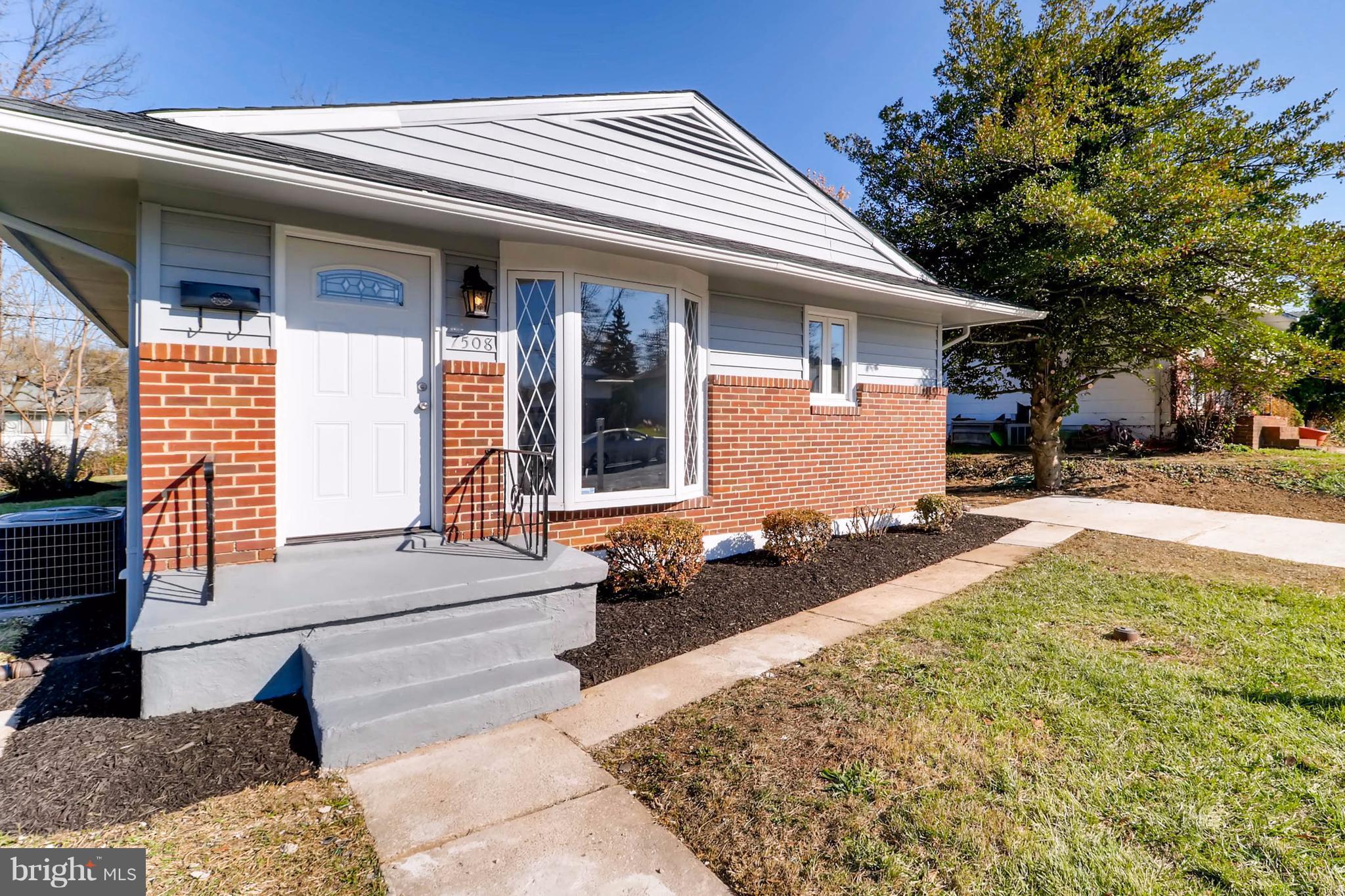 7508 Marston Road Baltimore, MD 21207 - Photo 3 of 18 a front view of a house with a yard