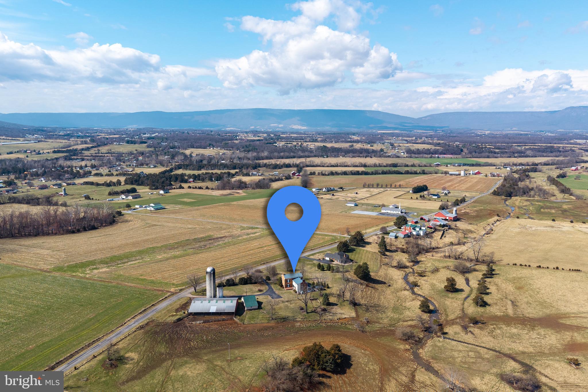 5329 Farmview Road Stanley, VA 22851 - Photo 105 of 111 a view of a lake with a nearby beach