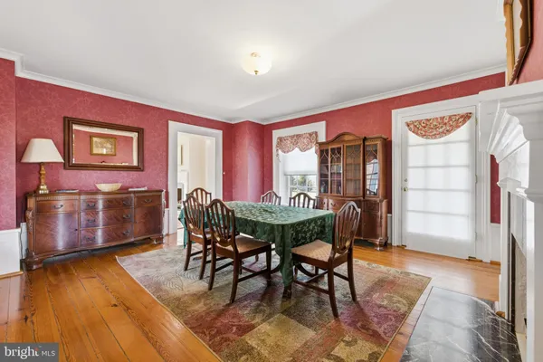 a living room with furniture fireplace and flat screen tv