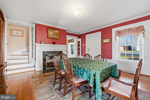 a living room with furniture fireplace and flat screen tv