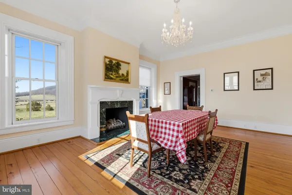 a bedroom with a bed and a fireplace