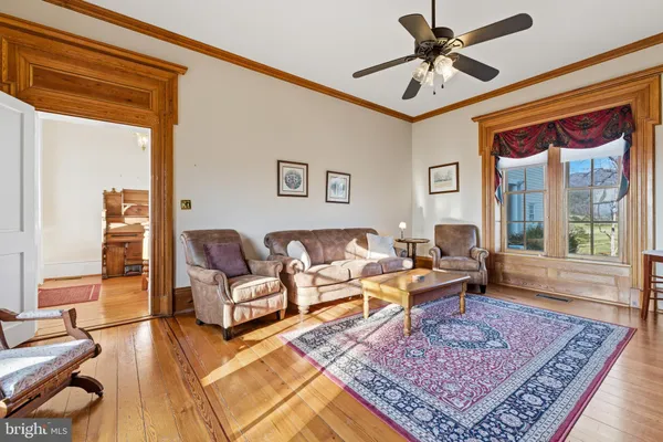 a spacious bedroom with a bed and a fireplace