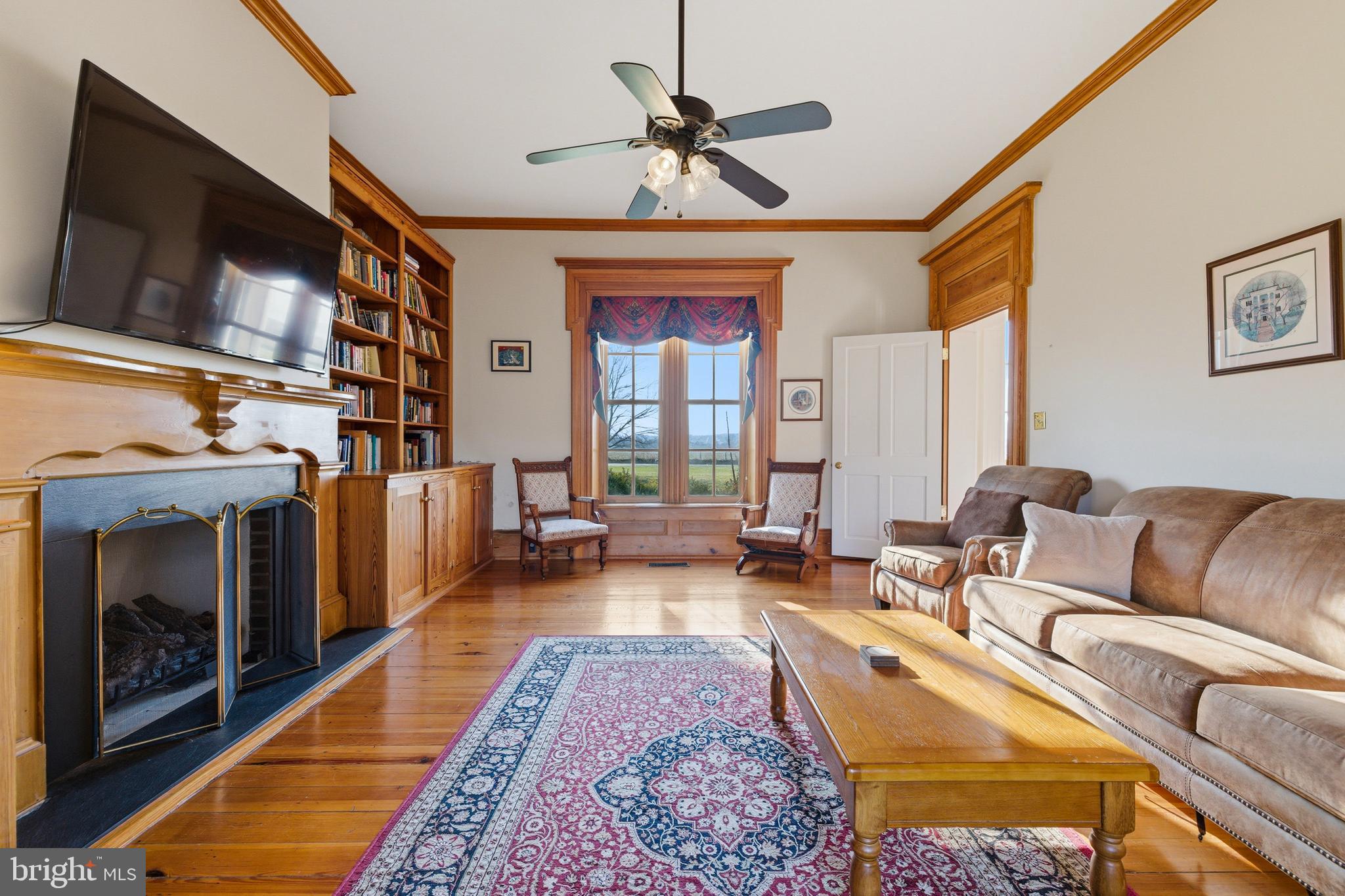 5329 Farmview Road Stanley, VA 22851 - Photo 31 of 111 a living room with furniture fireplace and flat screen tv