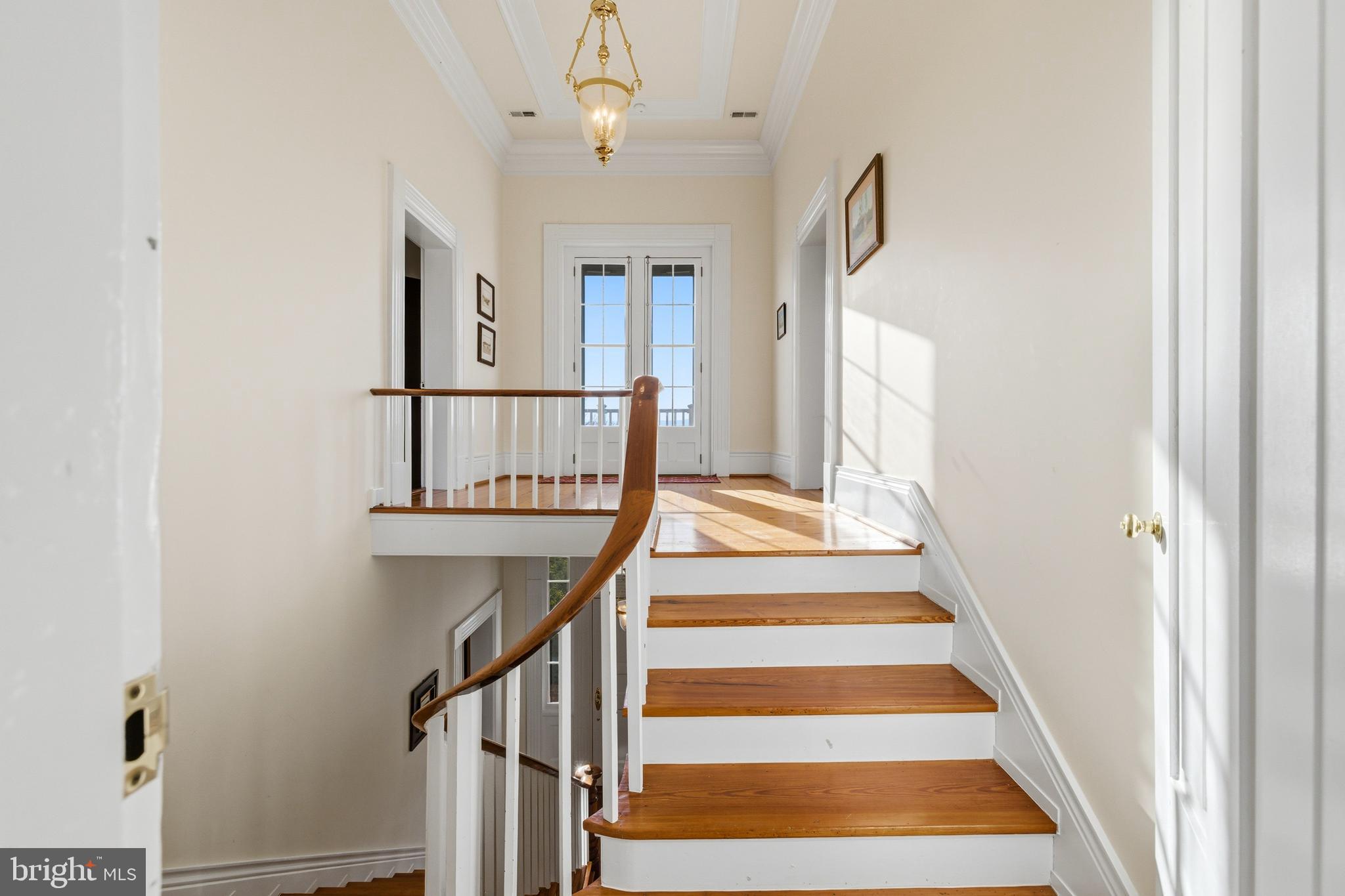 5329 Farmview Road Stanley, VA 22851 - Photo 35 of 111 a view of staircase with lots of frames on wall and a window