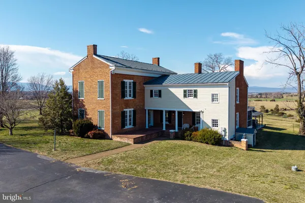 a view of a house with a window and wooden floor
