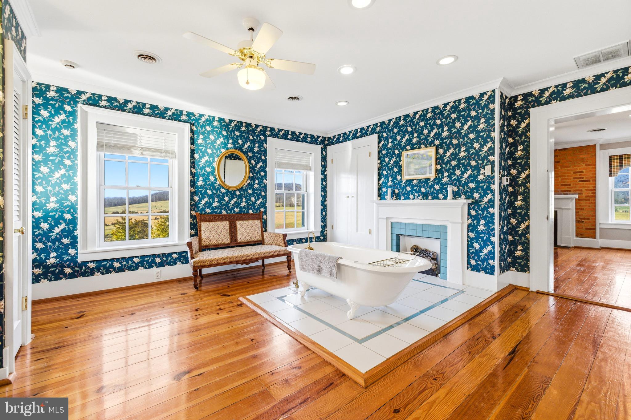 5329 Farmview Road Stanley, VA 22851 - Photo 42 of 111 a living room with fireplace furniture and a large window