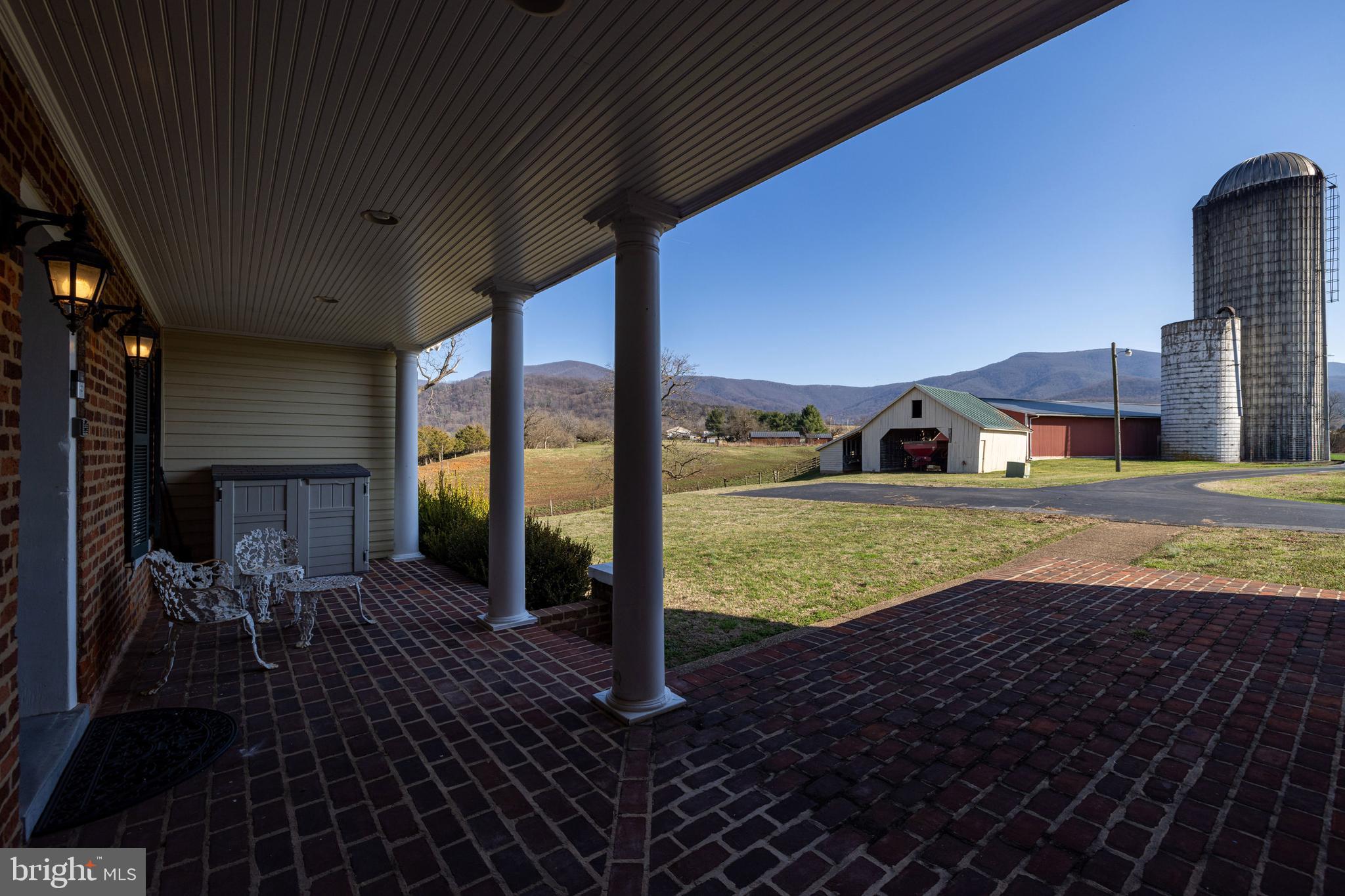 5329 Farmview Road Stanley, VA 22851 - Photo 77 of 111 a view of a house with backyard porch and sitting area
