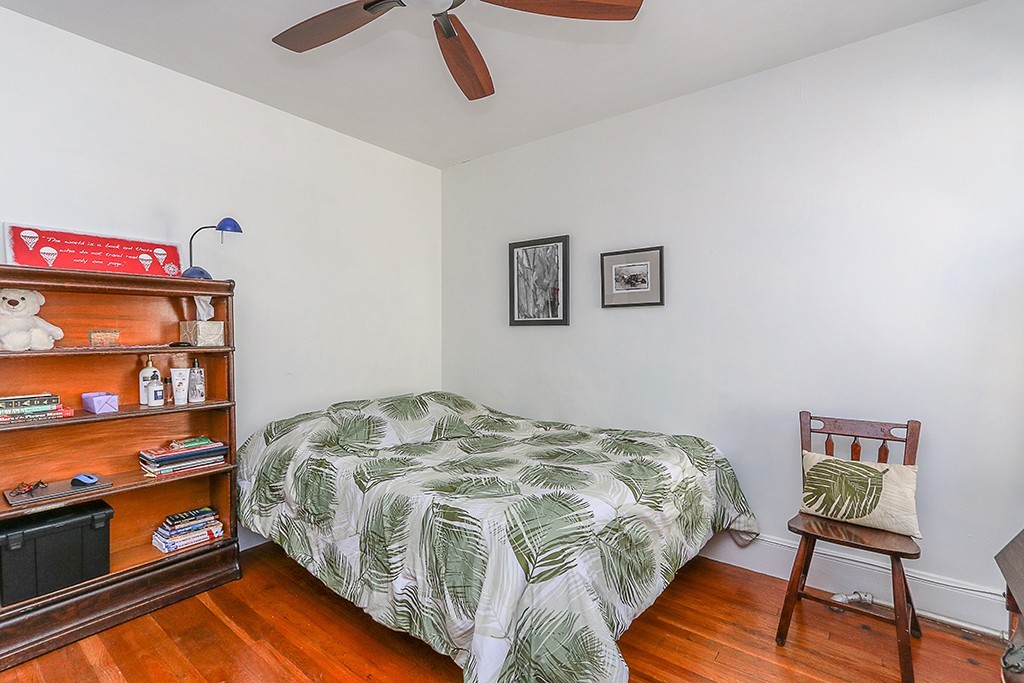112-114 Adena Road, Unit 112 Newton, MA 02465 - Photo 12 of 16 a bedroom with a bed and a workspace