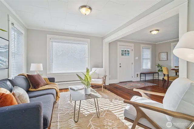 a living room with furniture and a table