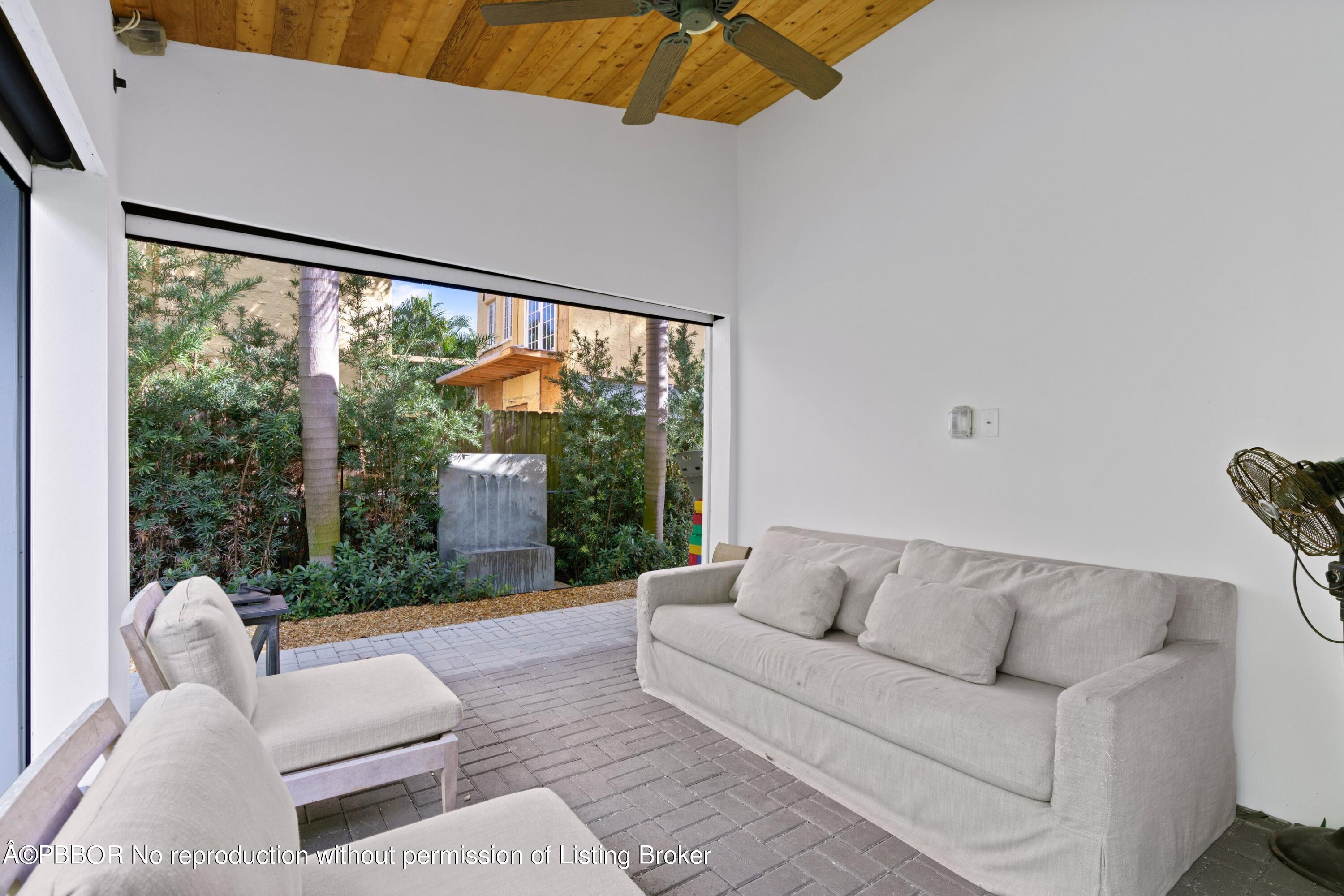 3210 Vincent Road West Palm Beach, FL 33405 - Photo 19 of 20 a living room with furniture and a large window