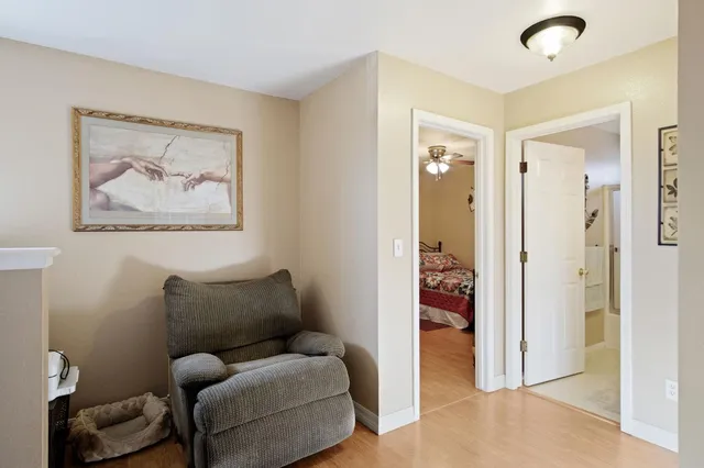 a living room with furniture and closet