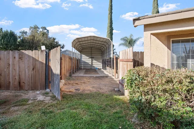 an aerial view of residential house with outdoor space
