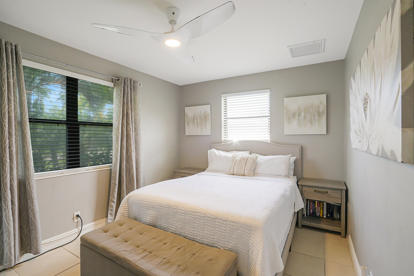 313 Davis Road Palm Springs, FL 33461 - Photo 21 of 39 a bedroom with a bed and a window