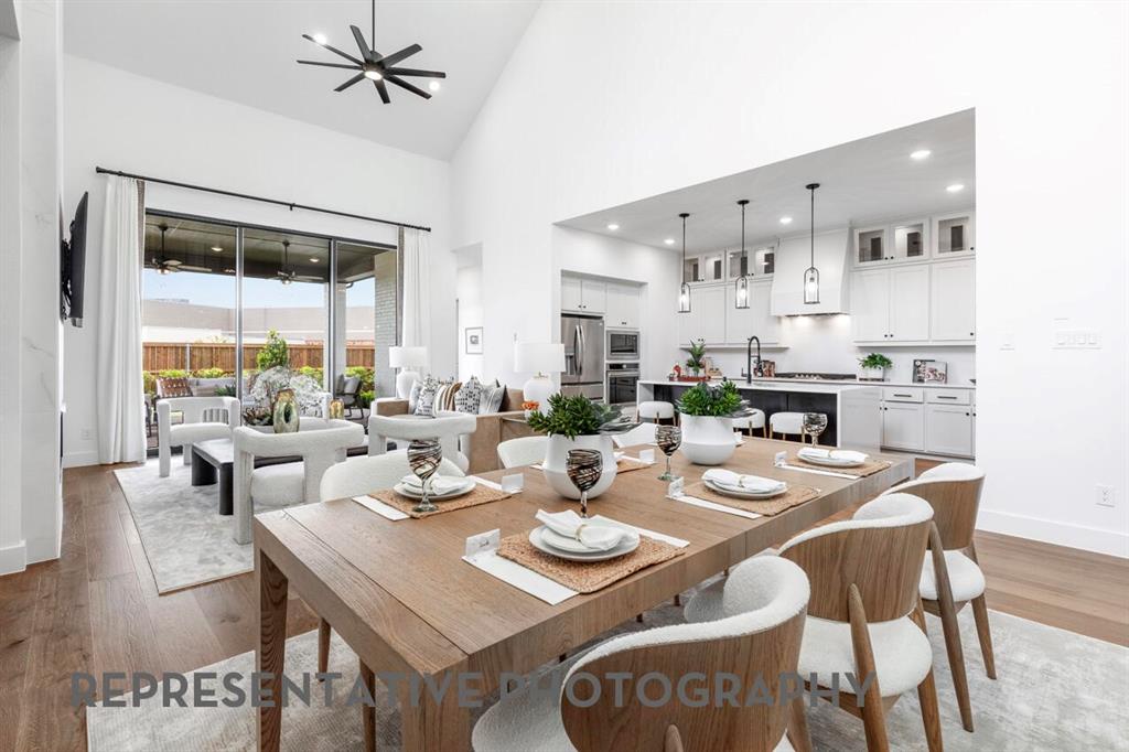 4415 Azalea Trail Oak Point, TX 75068 - Photo 24 of 38 a view of a dining room with furniture window and outside view