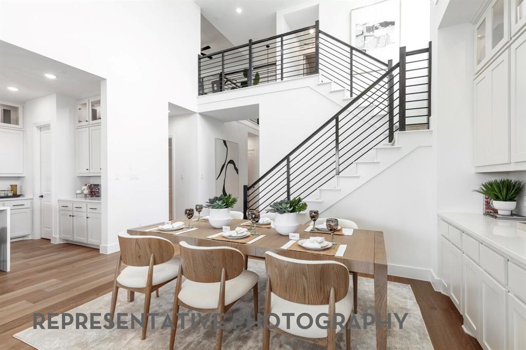 4415 Azalea Trail Oak Point, TX 75068 - Photo 25 of 38 a view of a dining room with furniture
