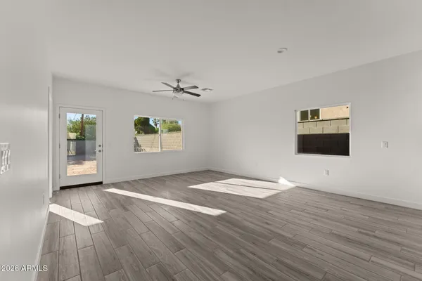 a view of an empty room with a window