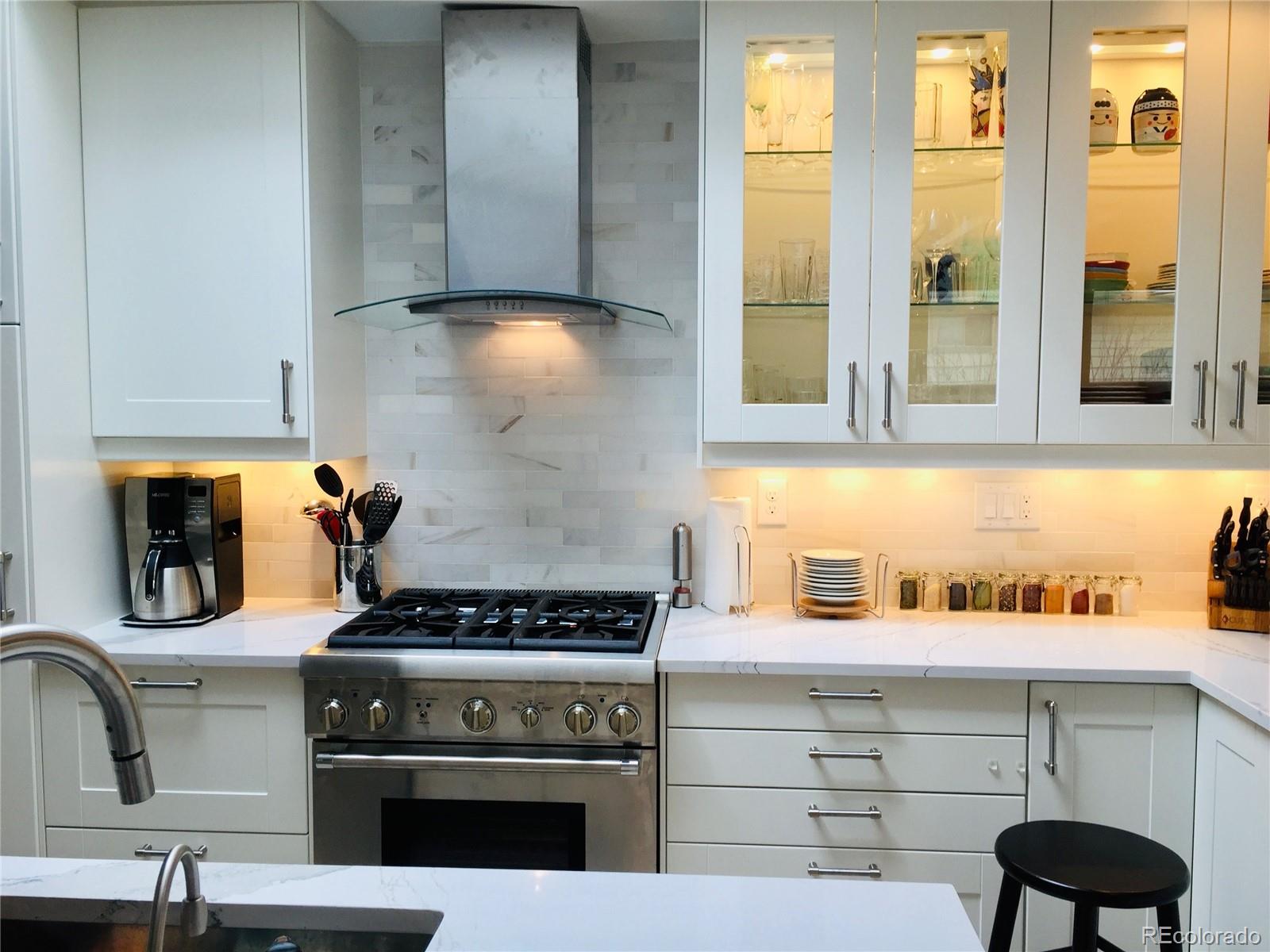 161 3rd Avenue Niwot, CO 80544 - Photo 12 of 41 a kitchen with a stove and a microwave