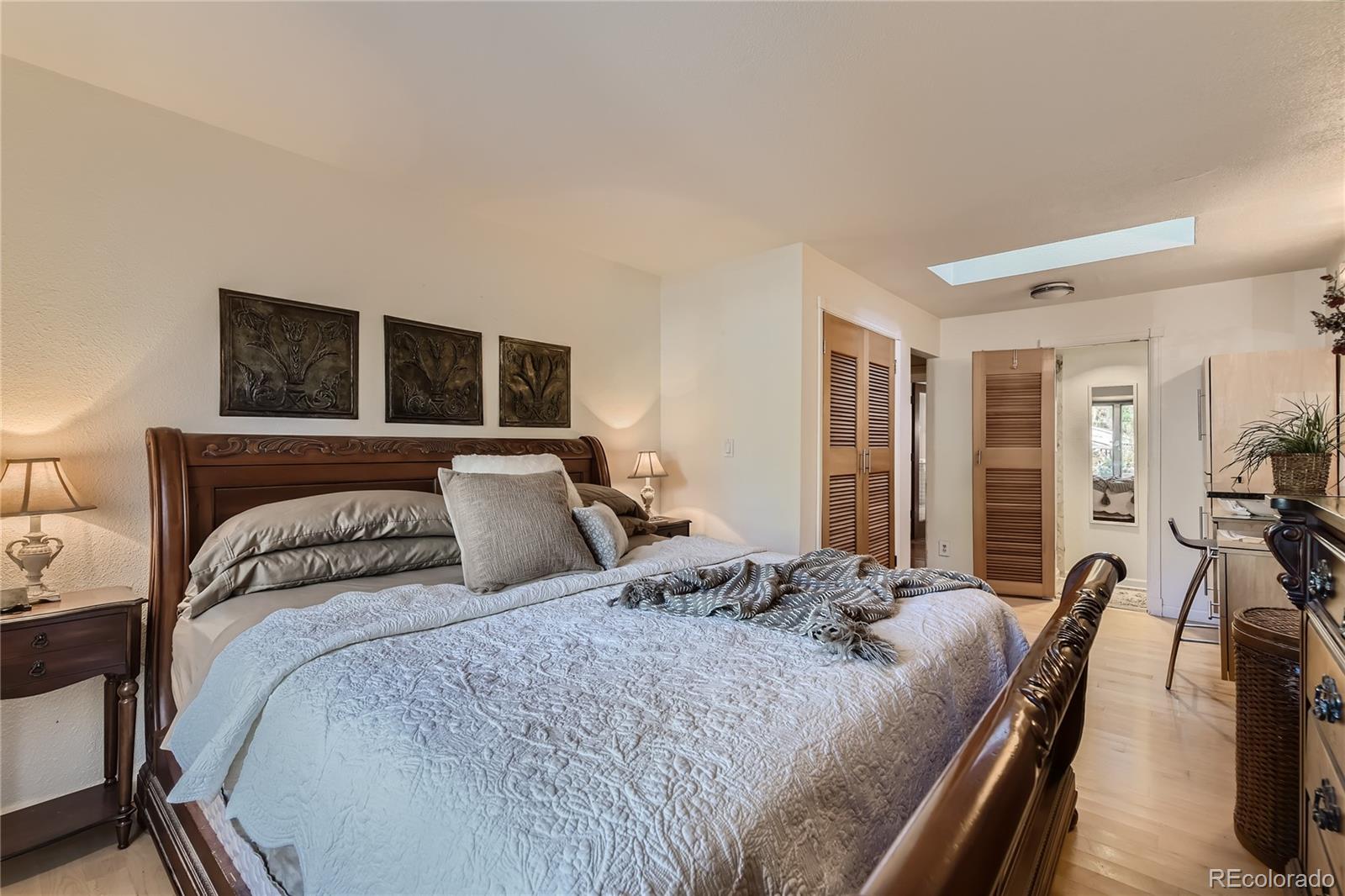 161 3rd Avenue Niwot, CO 80544 - Photo 19 of 41 a bedroom with a bed and furniture