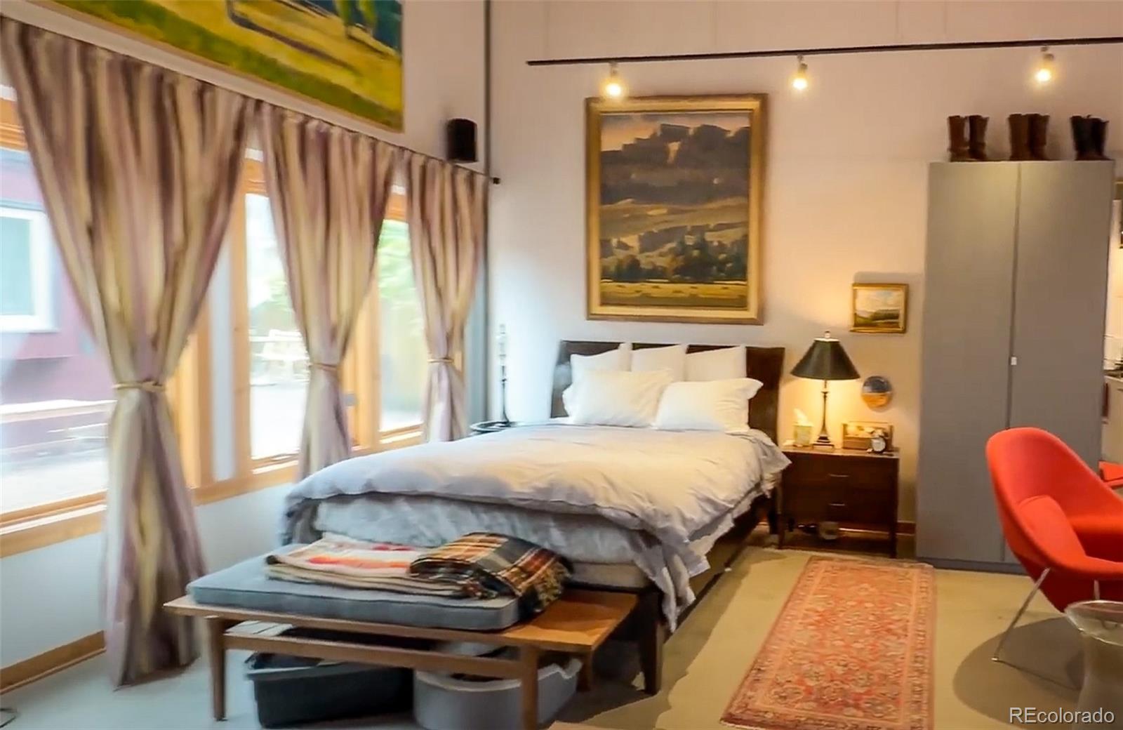 161 3rd Avenue Niwot, CO 80544 - Photo 37 of 41 a bedroom with a bed and a window