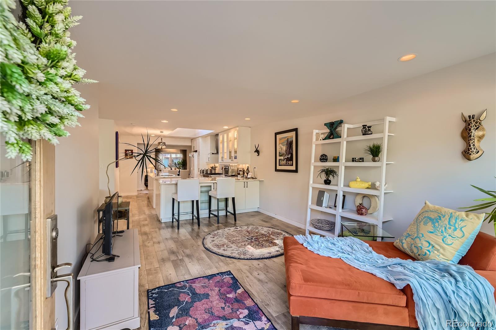 161 3rd Avenue Niwot, CO 80544 - Photo 6 of 41 a living room with furniture and a potted plant