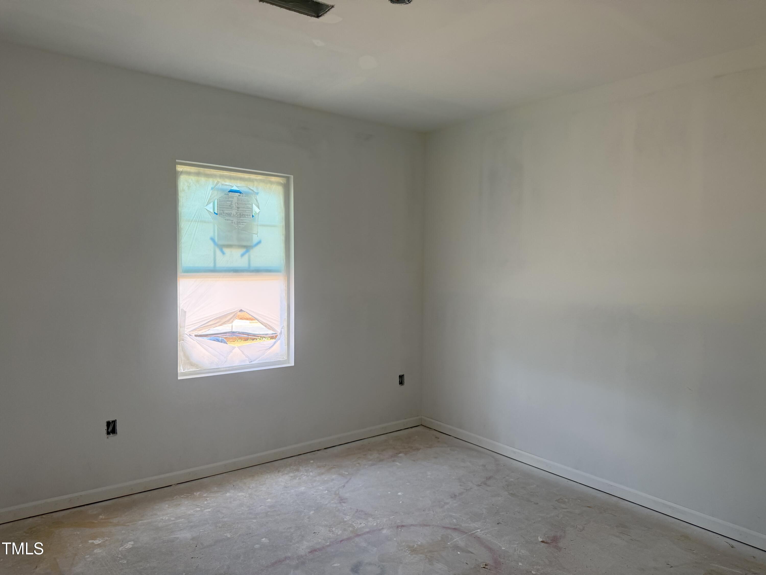 11751 Salers Loop Middlesex, NC 27557 - Photo 13 of 30 an empty room with a window