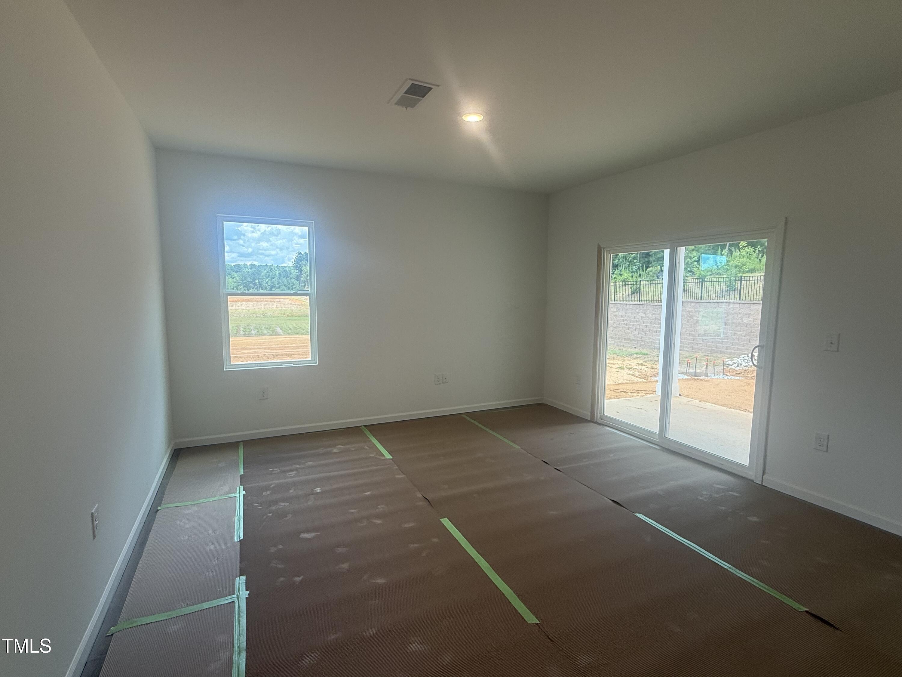 11751 Salers Loop Middlesex, NC 27557 - Photo 24 of 30 an empty room with windows