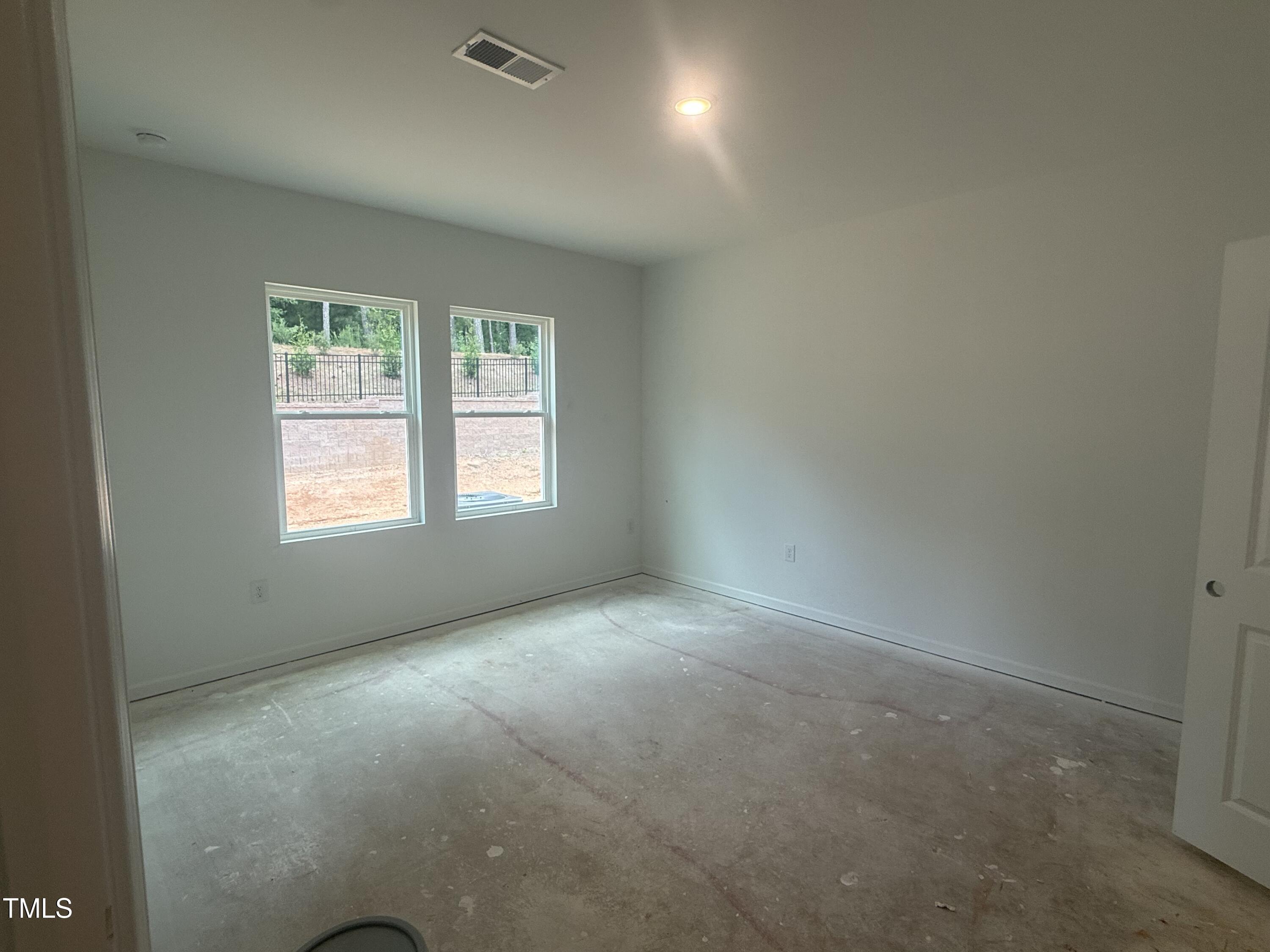 11751 Salers Loop Middlesex, NC 27557 - Photo 26 of 30 an empty room with a window