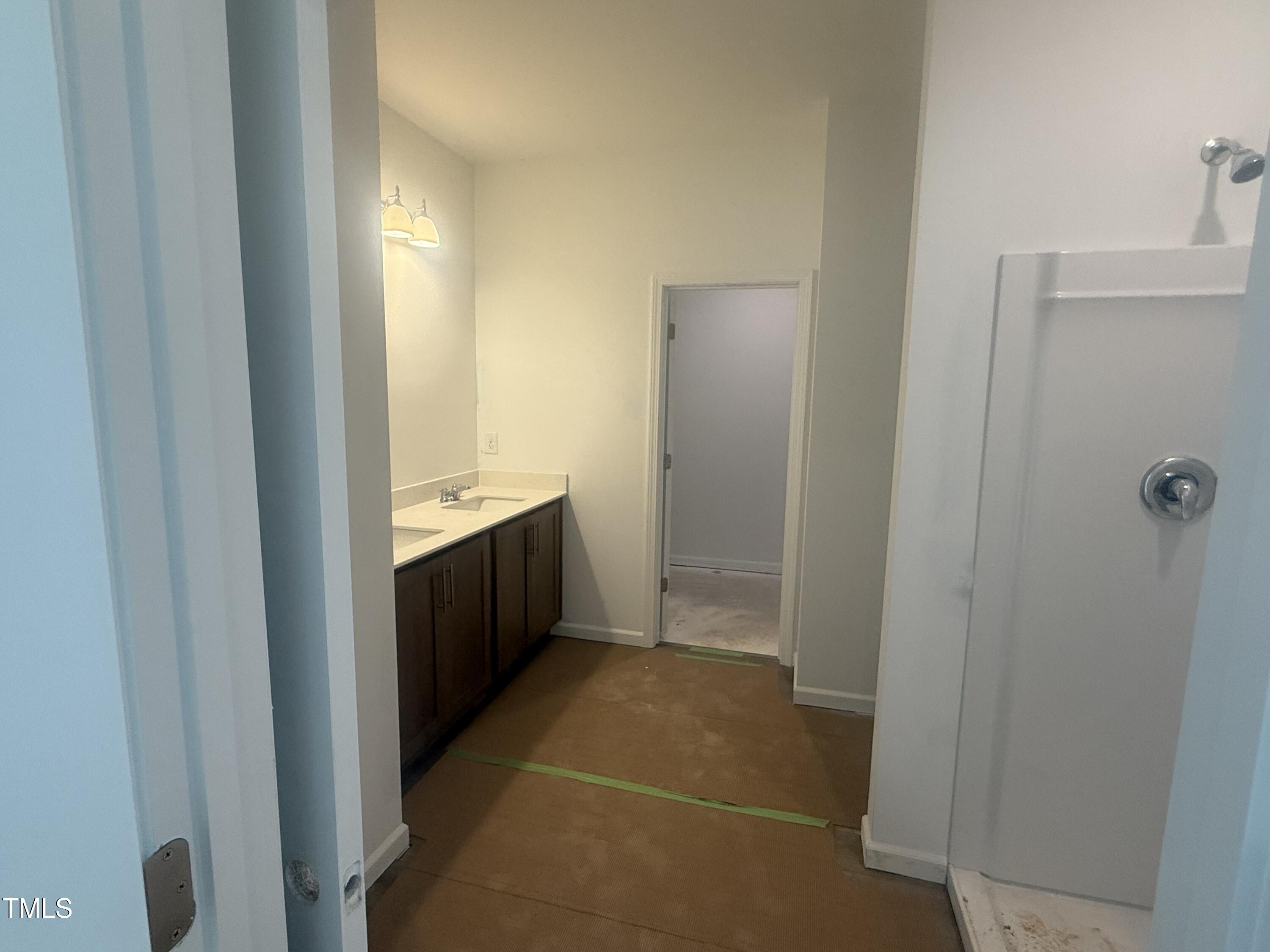 11751 Salers Loop Middlesex, NC 27557 - Photo 27 of 30 a bathroom with a double vanity sink and mirror