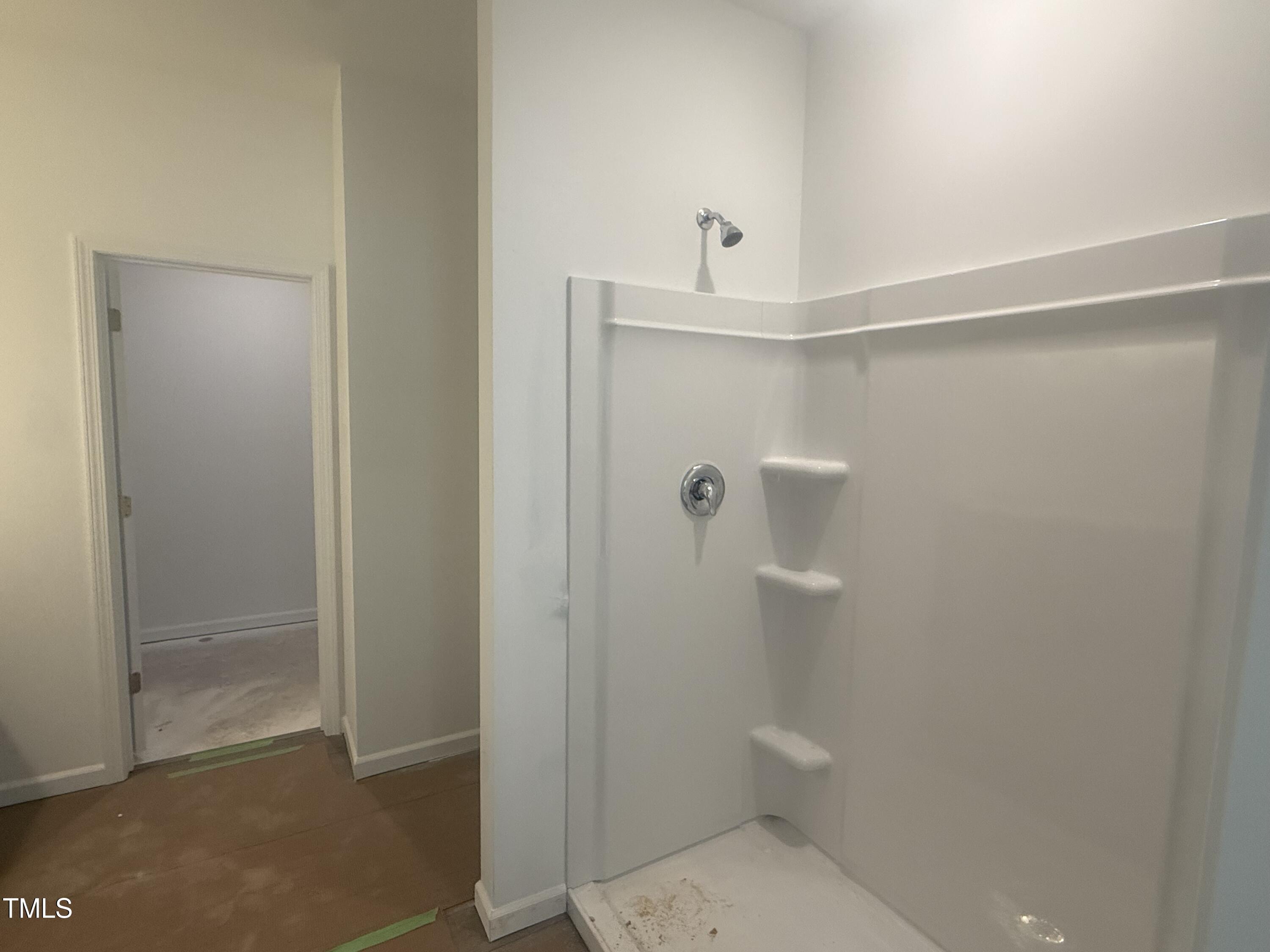 11751 Salers Loop Middlesex, NC 27557 - Photo 28 of 30 a bathroom with a shower