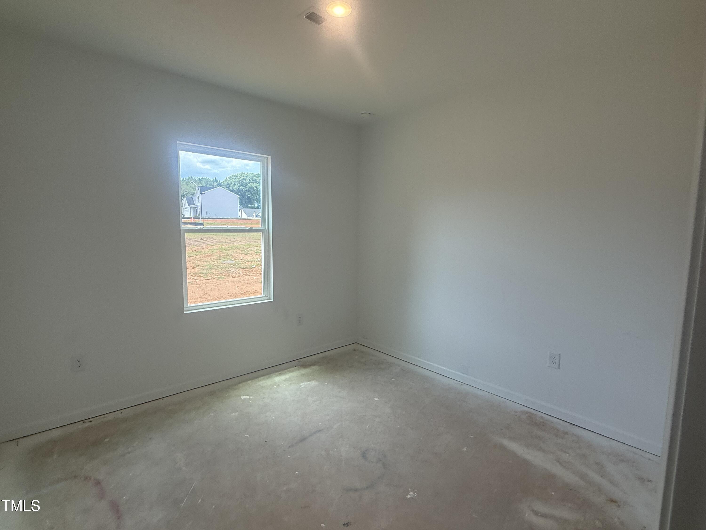 11751 Salers Loop Middlesex, NC 27557 - Photo 30 of 30 an empty room with a window