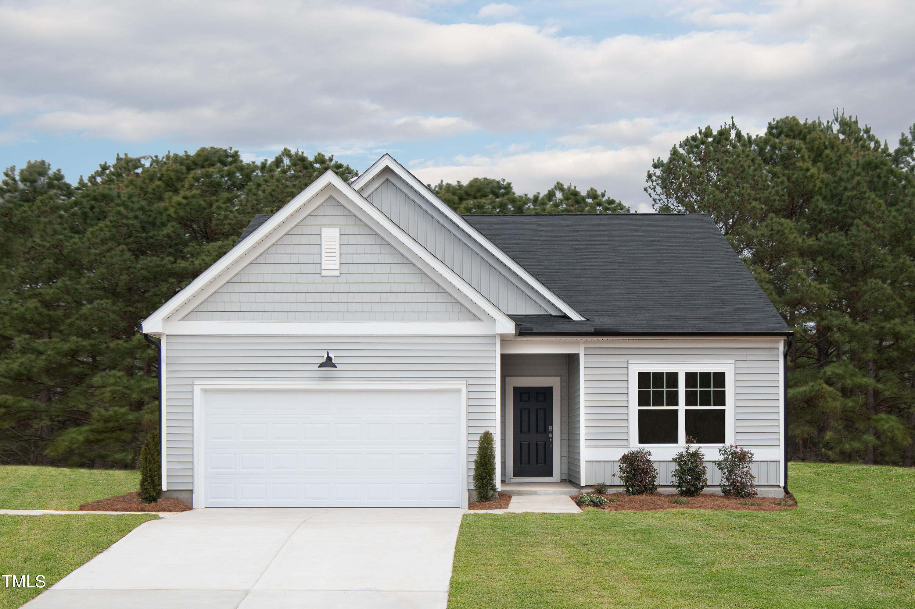 11751 Salers Loop Middlesex, NC 27557 - Photo 3 of 30 a front view of house with yard and green space