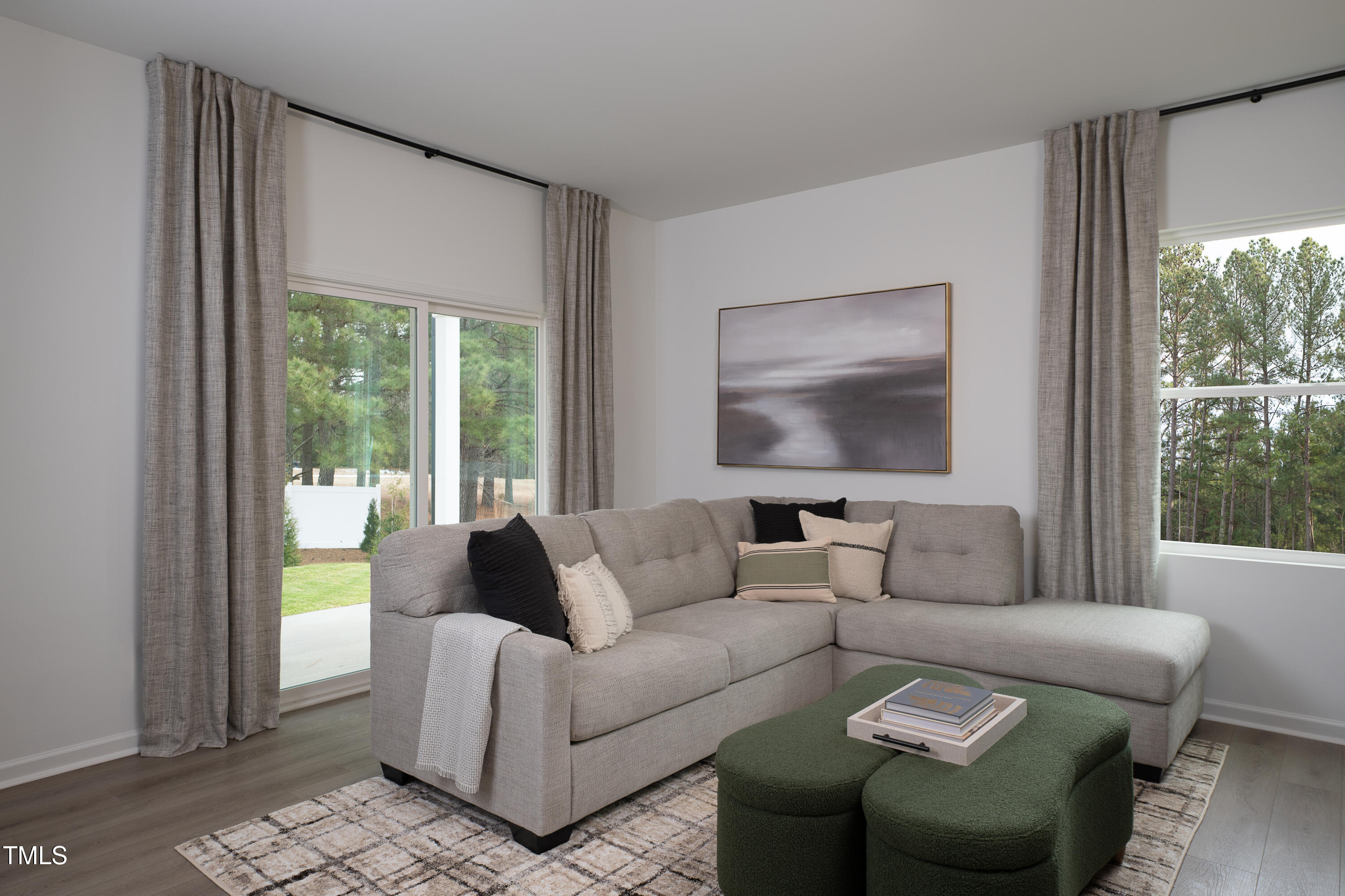 11751 Salers Loop Middlesex, NC 27557 - Photo 7 of 30 a living room with furniture and a large window