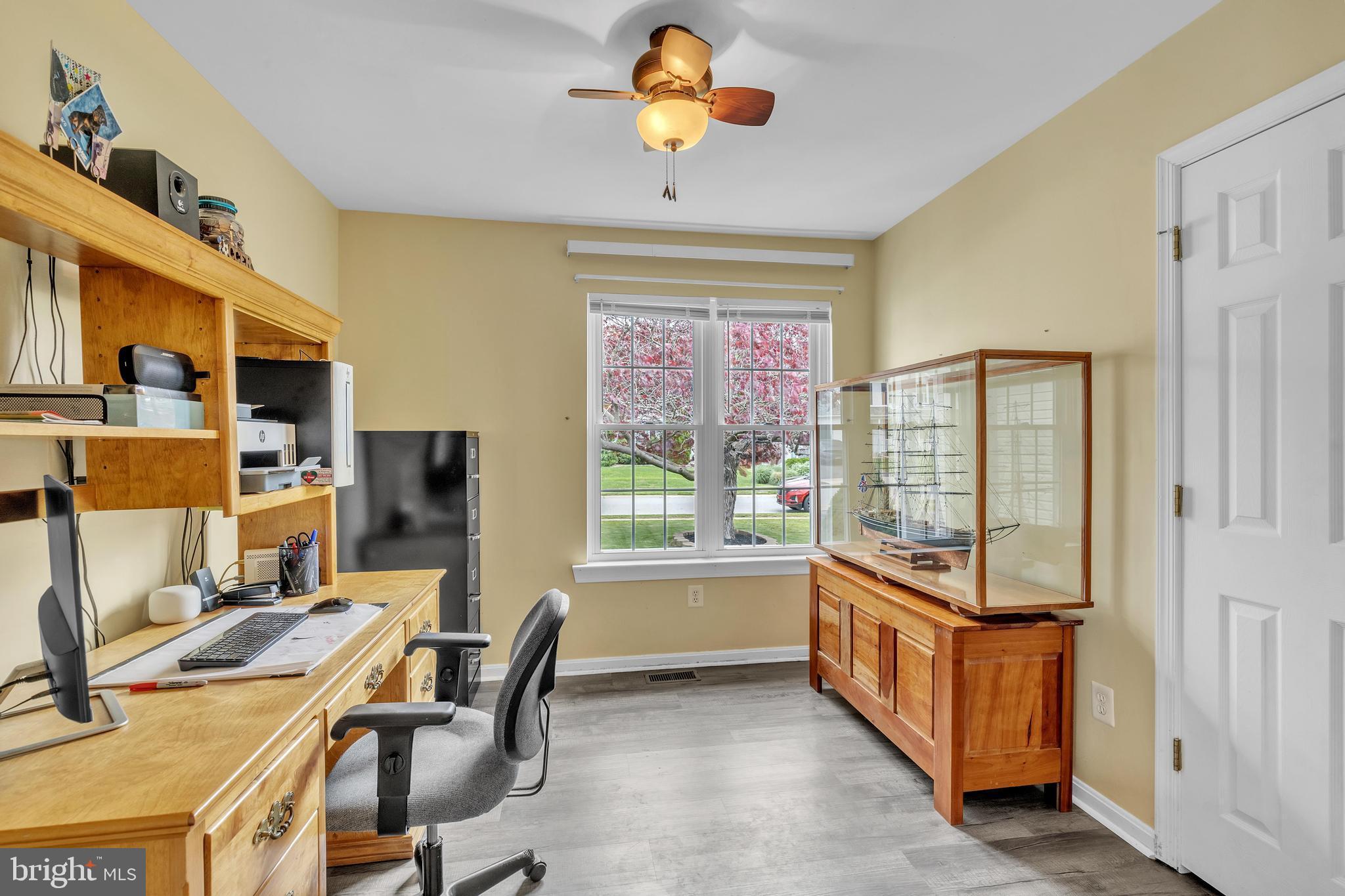 5 Patricia Circle Bear, DE 19701 - Photo 17 of 23 a workspace with chandelier