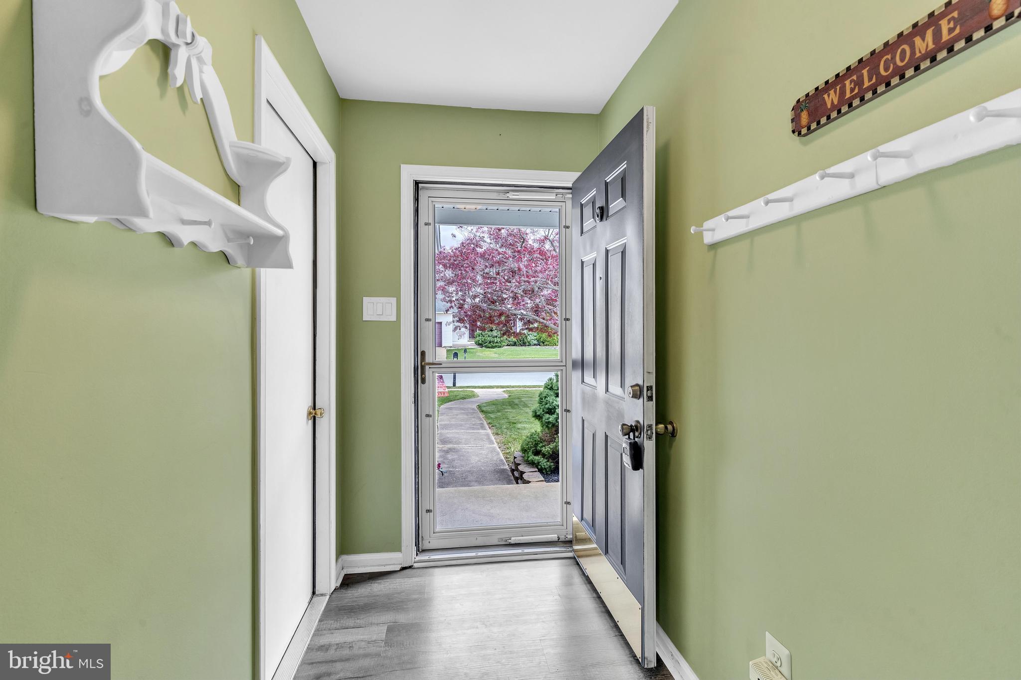 5 Patricia Circle Bear, DE 19701 - Photo 3 of 23 a view of a hallway with large window and front door