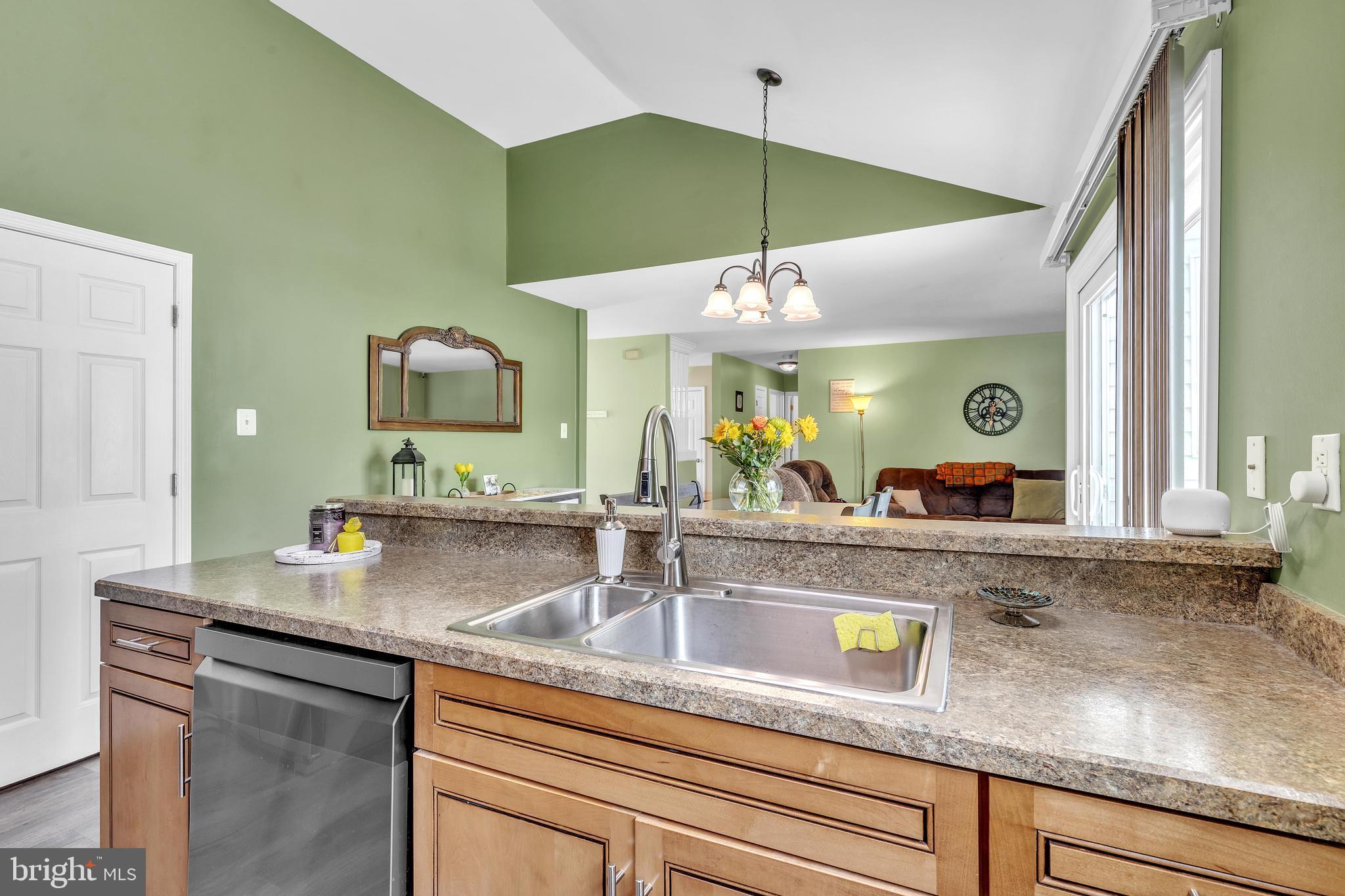 5 Patricia Circle Bear, DE 19701 - Photo 10 of 23 a kitchen with stainless steel appliances granite countertop a sink a counter space and cabinets