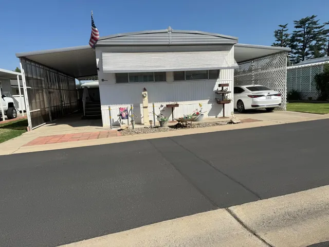a view of car parked in front of house