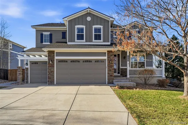 a front view of a house with glass door