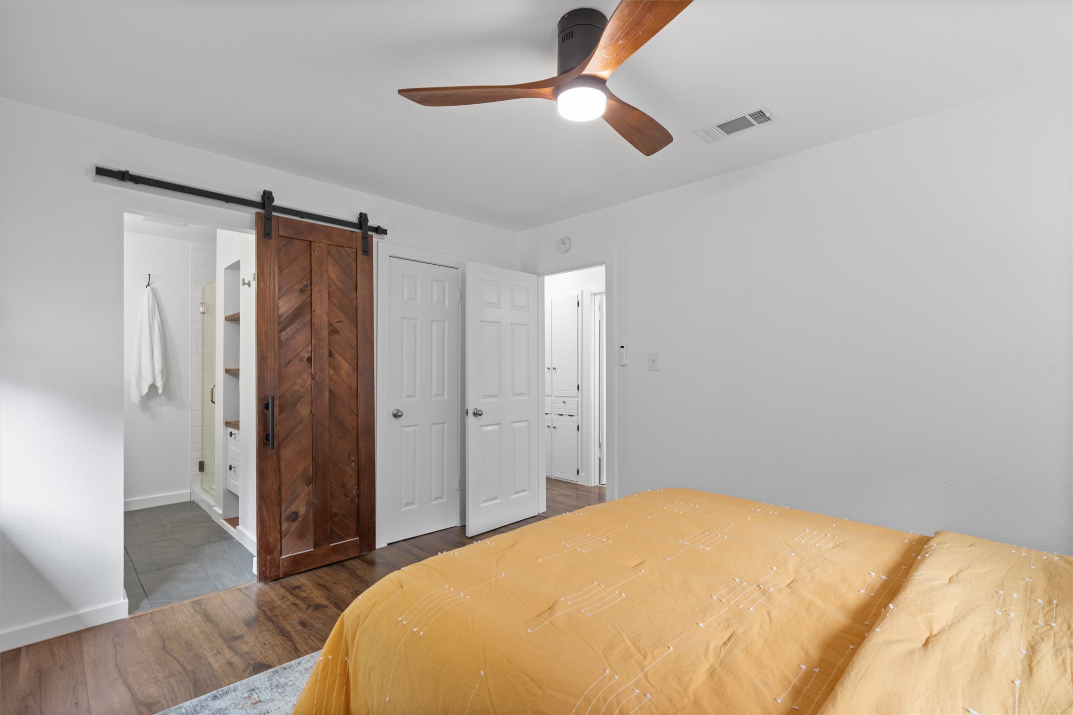 8436 Bangor Bend Austin, TX 78758 - Photo 15 of 29 The primary suite features a walk-in closet and its own ensuite.