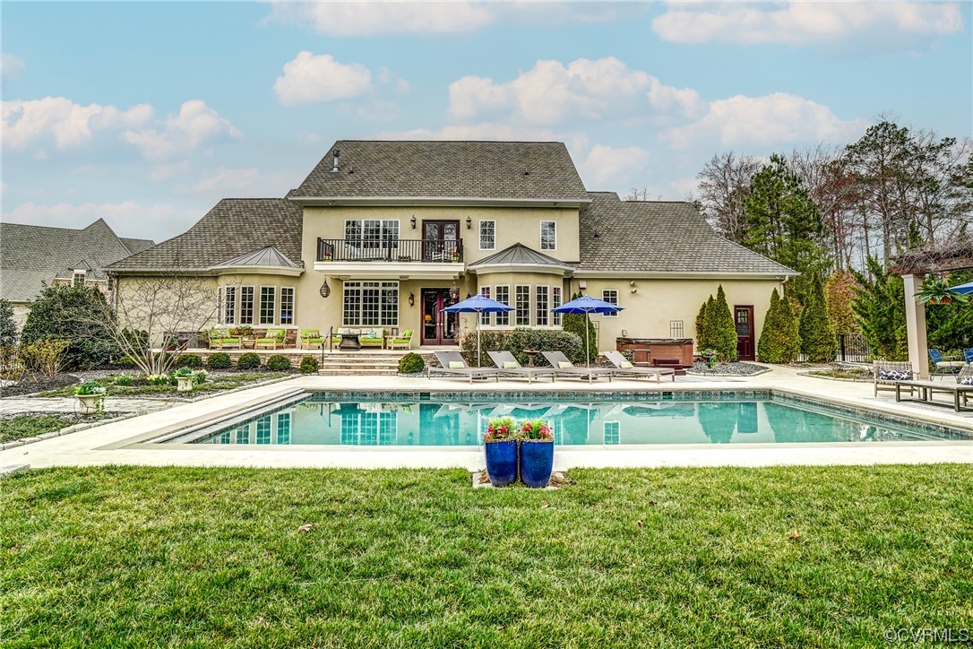 700 Old Stream Road Manakin-Sabot, VA 23103 - Photo 46 of 50 a front view of a house with swimming pool having outdoor seating