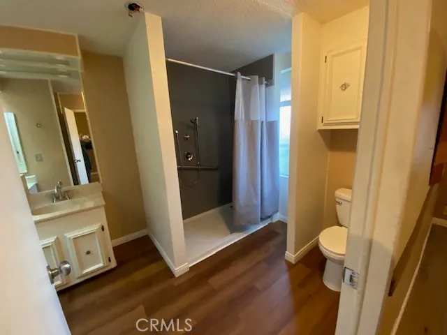 a bathroom with a sink and toilet