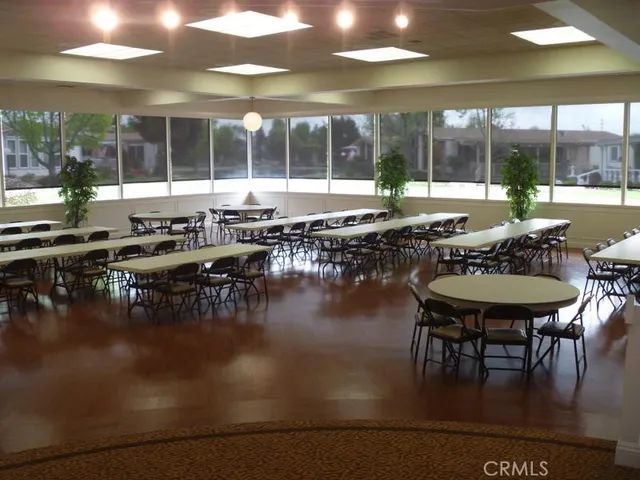 a view of a workspace with furniture