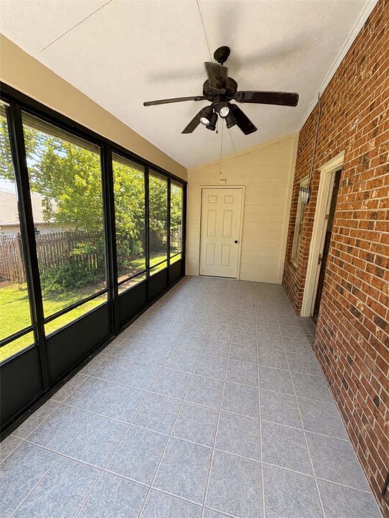 2018 Cardinal Park Drive Anderson, SC 29621 - Photo 6 of 11 An inviting sunroom with generous windows and easy-care tile flooring extends the living space.