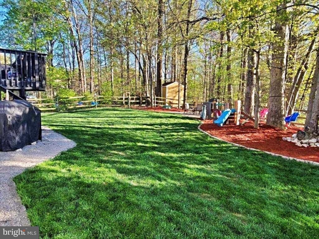 8373 Magic Leaf Road Springfield, VA 22153 - Photo 14 of 69 a view of a park with large trees