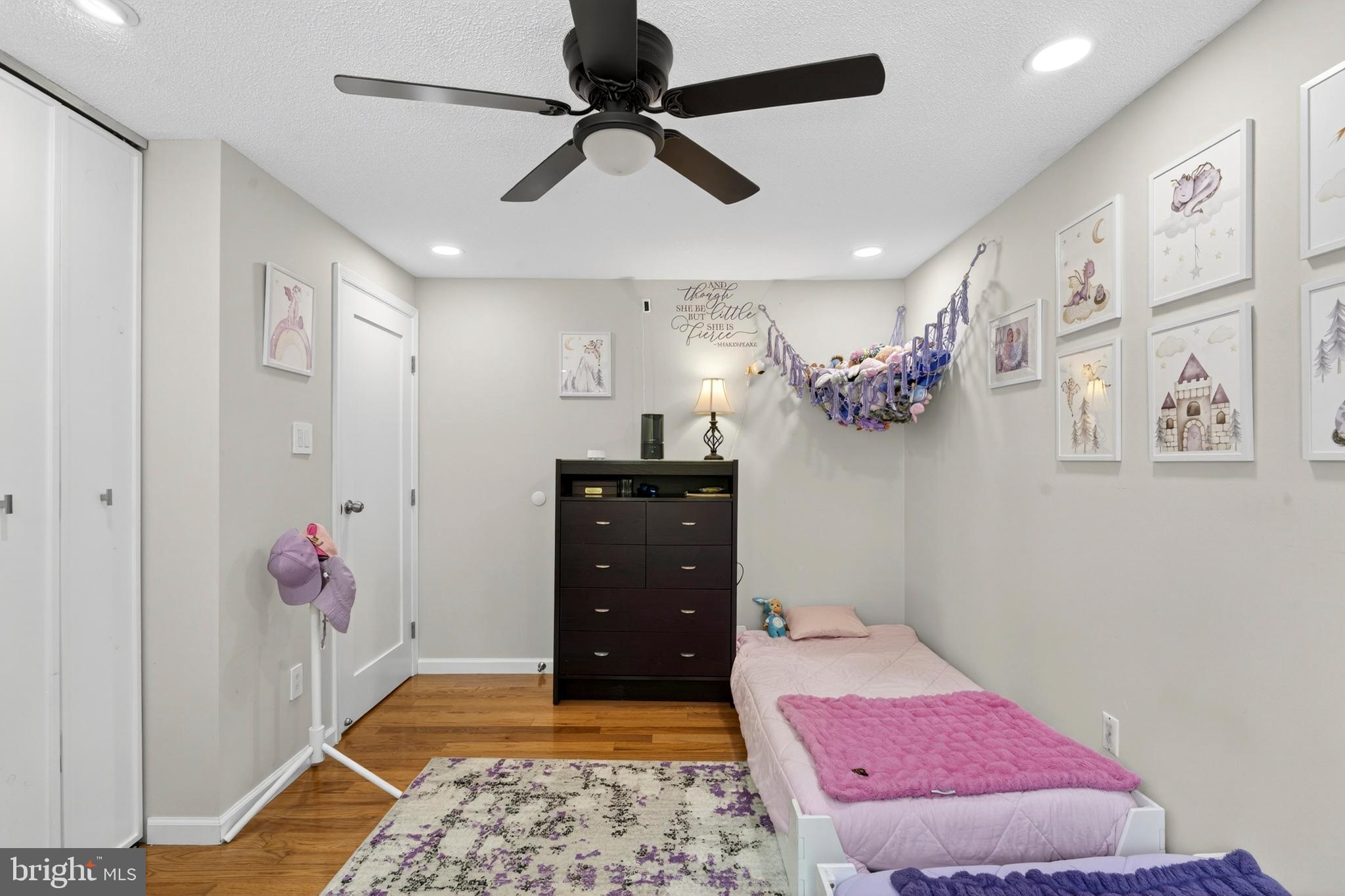 8373 Magic Leaf Road Springfield, VA 22153 - Photo 36 of 69 a bedroom with a bed and a mirror