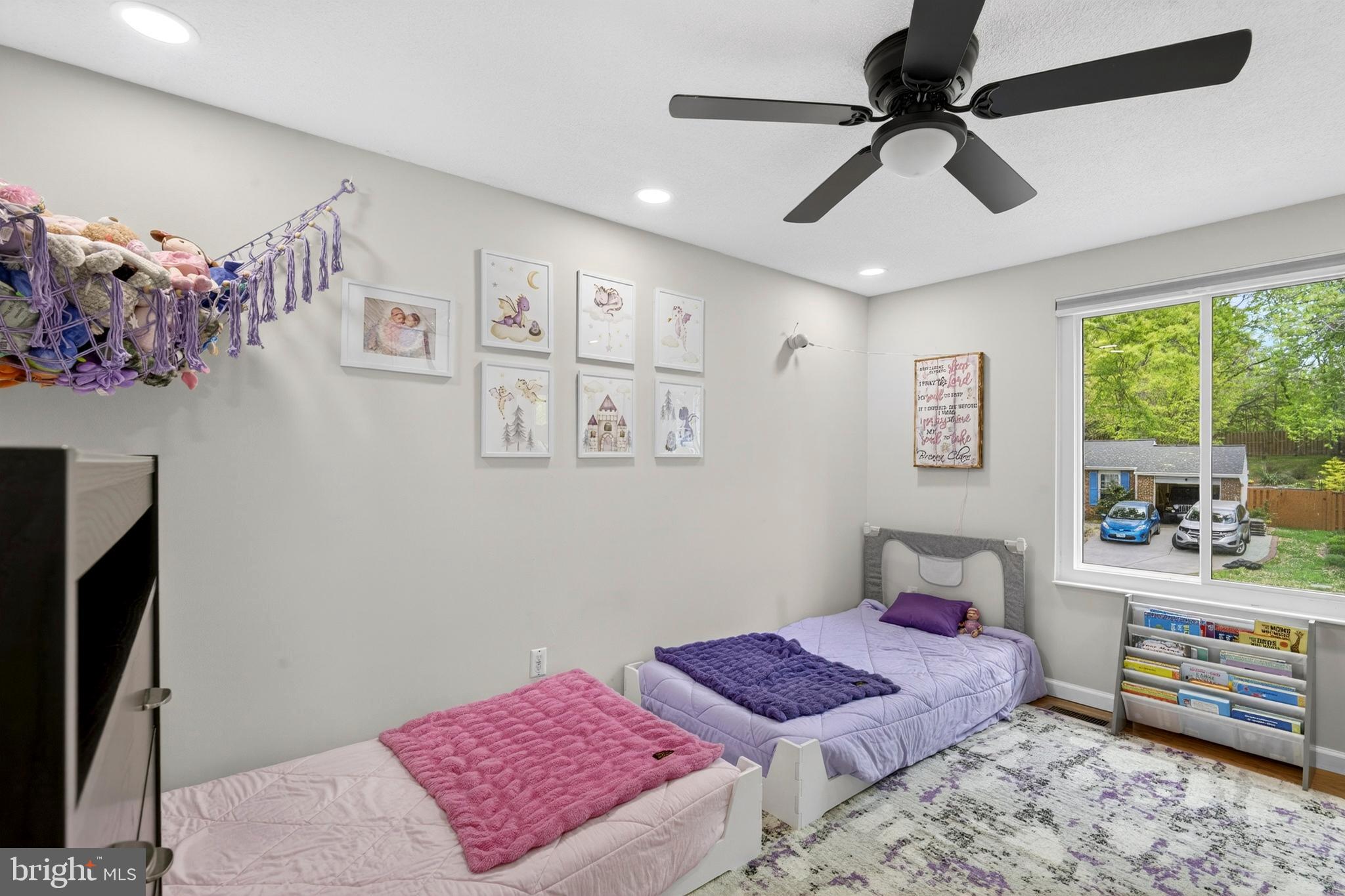 8373 Magic Leaf Road Springfield, VA 22153 - Photo 37 of 69 a bedroom with furniture and a window