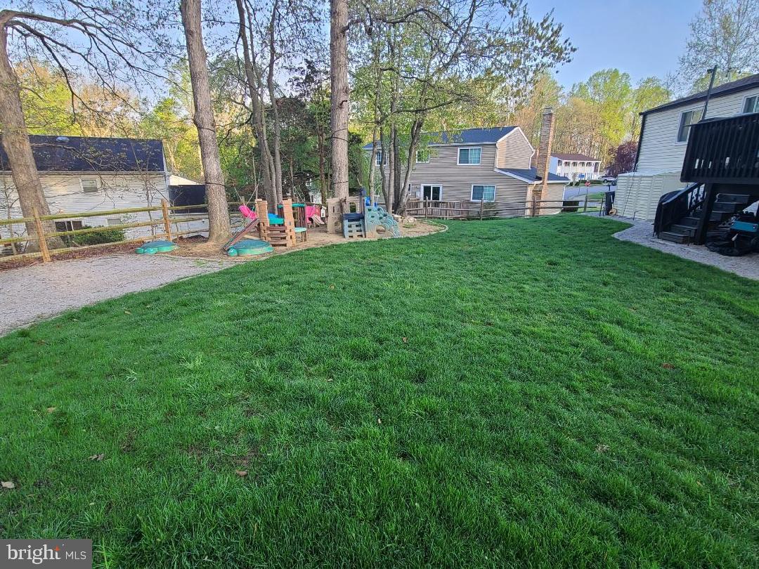8373 Magic Leaf Road Springfield, VA 22153 - Photo 4 of 4 Very large professionally landscaped backyard.