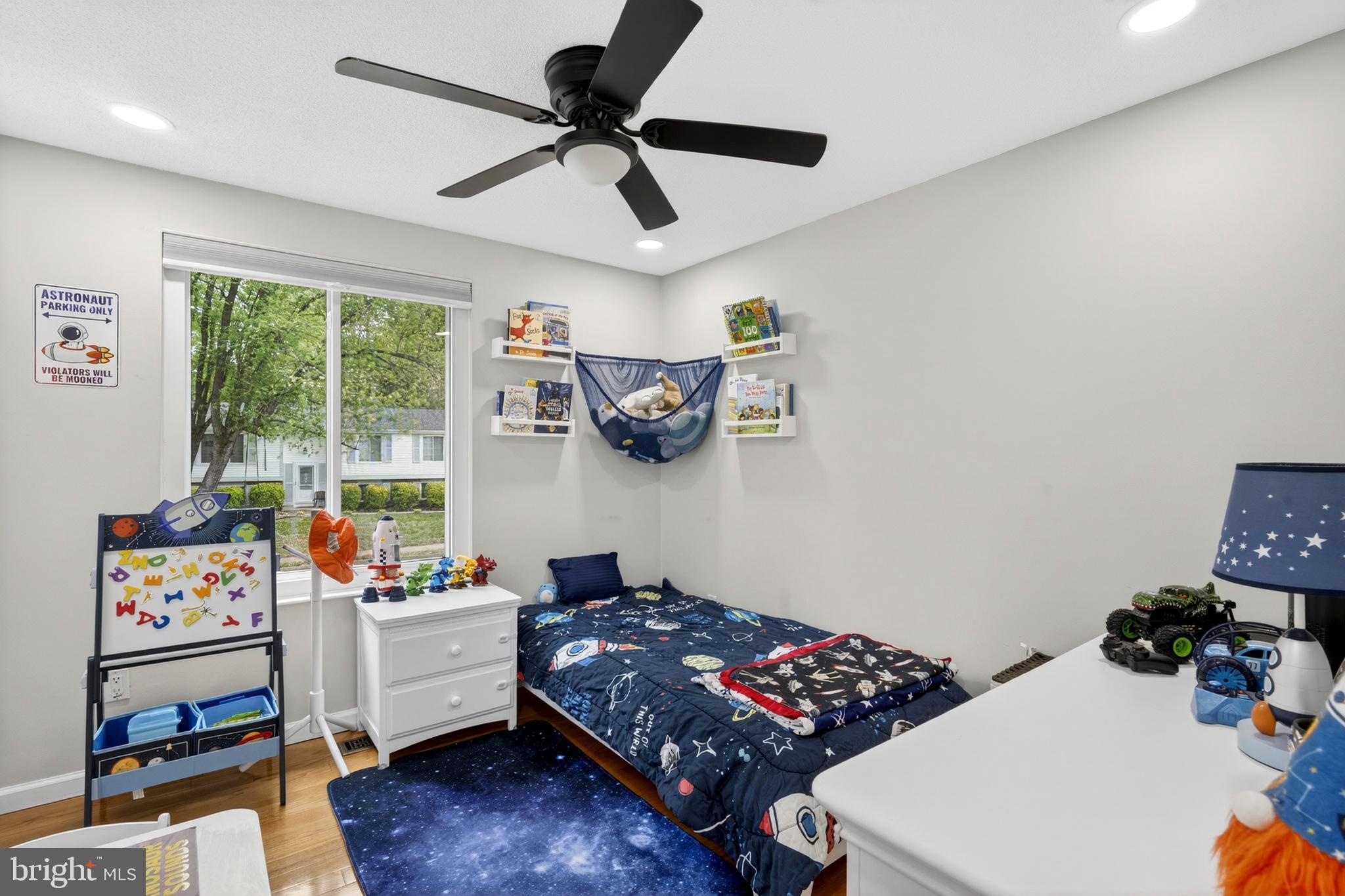 8373 Magic Leaf Road Springfield, VA 22153 - Photo 45 of 69 a bedroom with furniture and a window