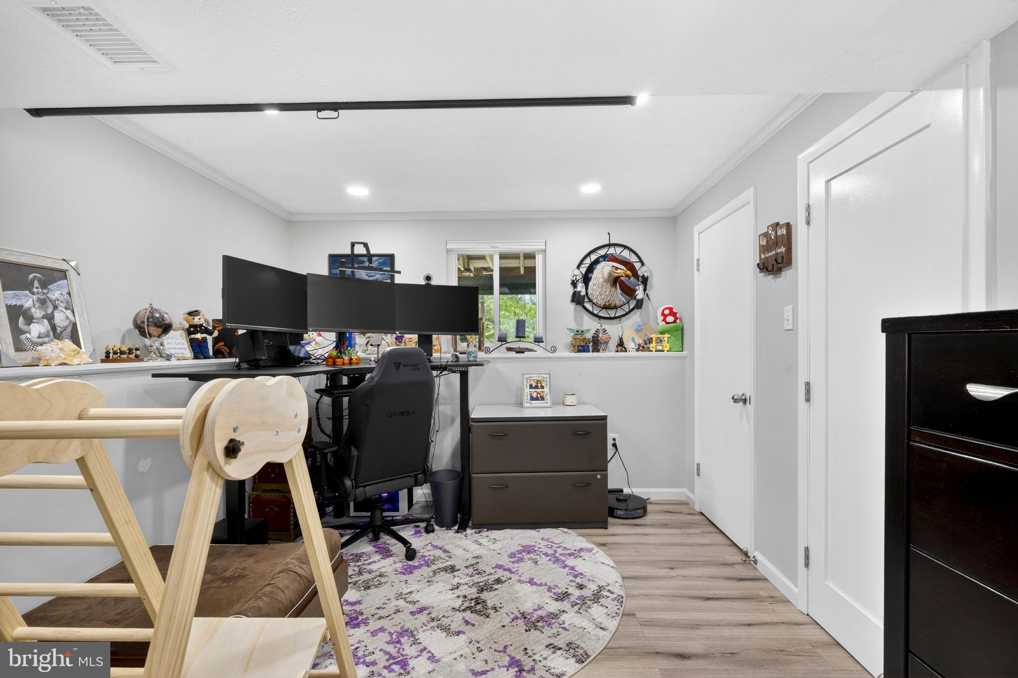 8373 Magic Leaf Road Springfield, VA 22153 - Photo 52 of 69 a view of a kitchen with fridge and workspace