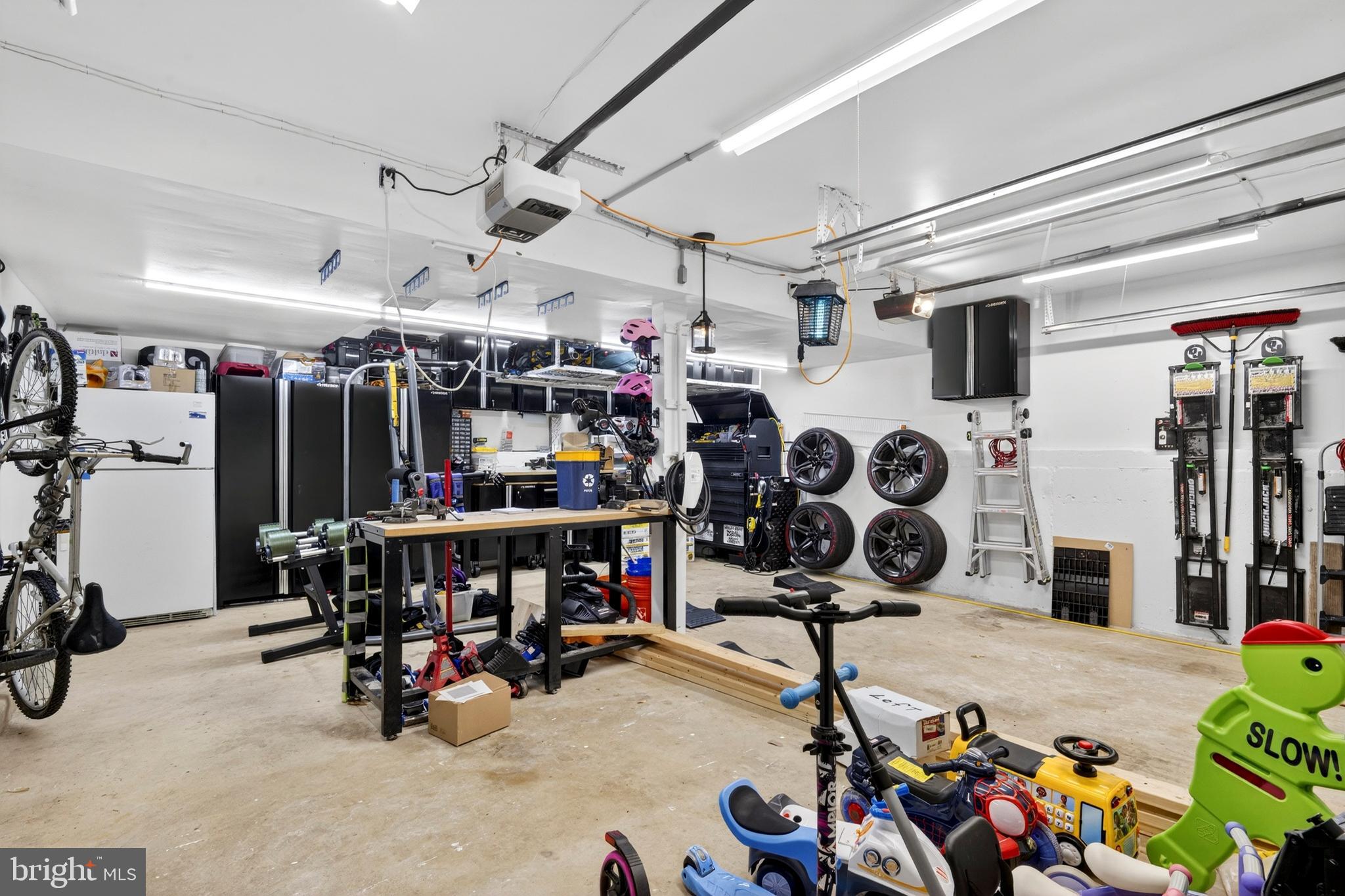 8373 Magic Leaf Road Springfield, VA 22153 - Photo 59 of 69 a view of a room with gym equipment