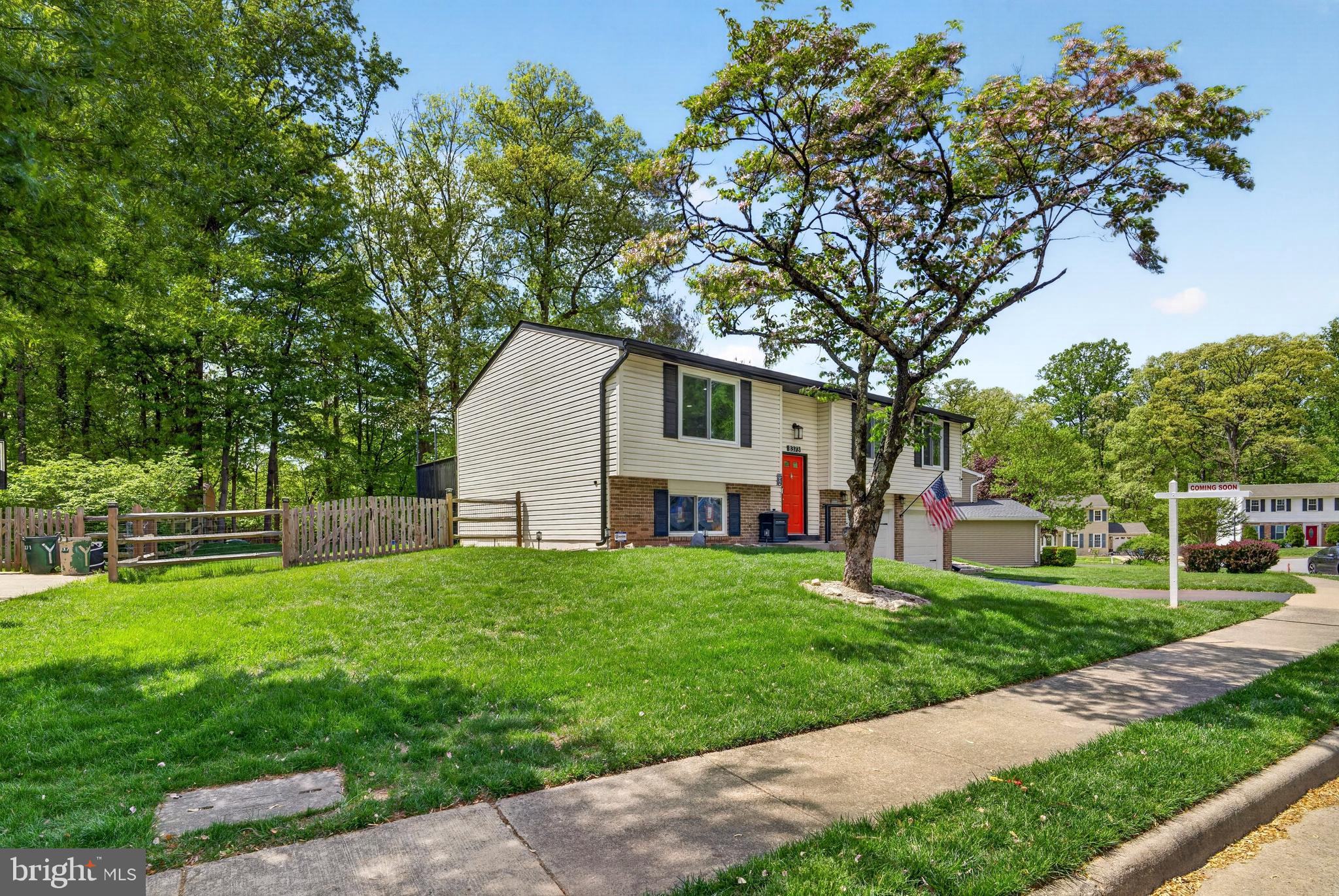 8373 Magic Leaf Road Springfield, VA 22153 - Photo 6 of 69 a front view of house with yard and green space